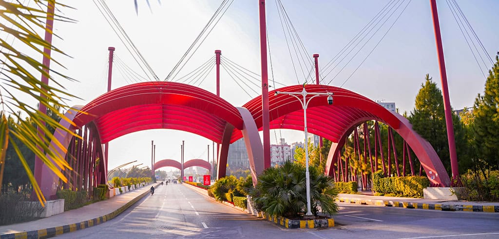 gulberg islamabad gate symbol red steel four